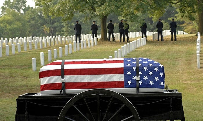 who gets the flag at a military funeral